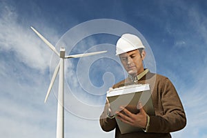 Engineer Working At Wind Farm