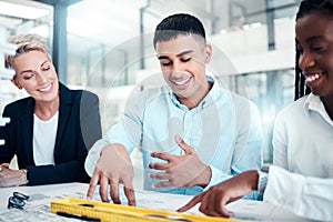 Engineering, architecture and happy team in a meeting planning a creative office building or floor plan blueprint. Smile