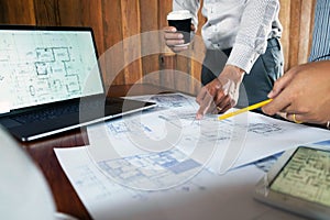 Engineering, consulting, design, construction, with colleagues, plan design, details, industrial drawing and many drawing tools