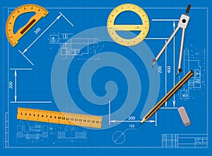 Engineering drawing on a blue background and tools to measure