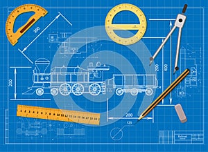 Engineering drawing on a blue background and tools