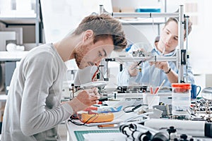 Engineering students working in the lab