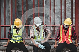 Engineering team unemployed on the construction site of the house