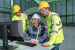 Engineering team working use computer operate in the warehouse design