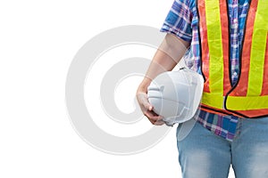 Engineering woman holding a white safety helmet standing on an isolated background