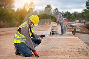 Engineering working outside inspect the concrete road