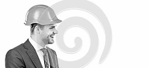 Engineering that works. Civil engineer side-face. Happy engineer in hardhat. Profile portrait