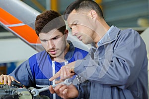 engineers check aircraft systems