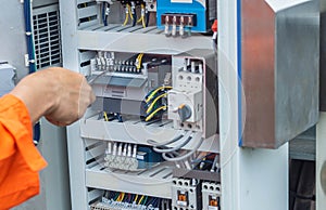 Engineers are checking the operation of the control panel  solar panel adjustment system according to the sun  Professional