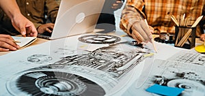 Engineers Collaborating on Aircraft Engine Design with Technical Drawings and Modern Technology in a Creative Workspace