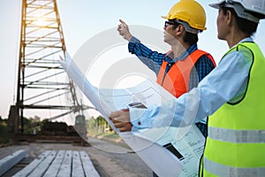 Engineers and contractors are discussing house construction plans
