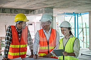 Engineers are discussing at building site