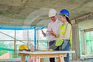 Engineers are discussing at building site