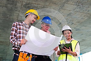 Engineers are discussing at building site