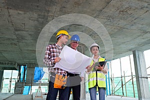 Engineers are discussing at building site