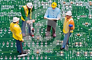 Engineers Fixing Computer