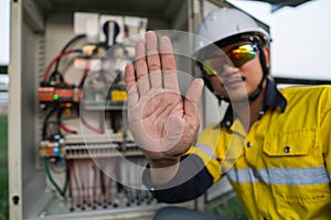 Engineers lifted their hands to show signs that do not enter in to the dangerous area