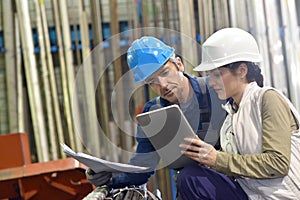 Engineers in metallurgic industry working