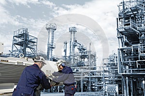 Engineers and oil refinery