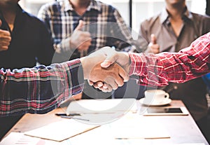 Engineers shaking hands