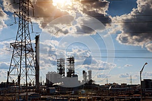 engineers standing surrounded by pipelines oil and gas industry