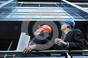Engineers supervising construction site