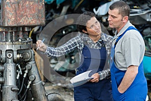 engineers working on machines