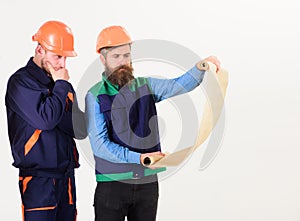 Engineers working on project. Civil engineer and senior foreman