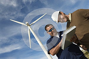 Engineers Working At Wind Farm