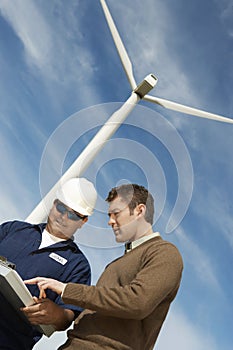 Engineers Working At Wind Farm