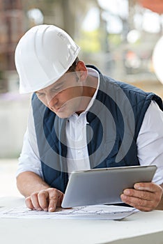 enginer holding with digital tablet photo
