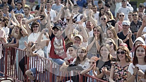 England - Bristol, 07.212019: audience at the event looking at something on a summer sunny day. Action. Many spectators