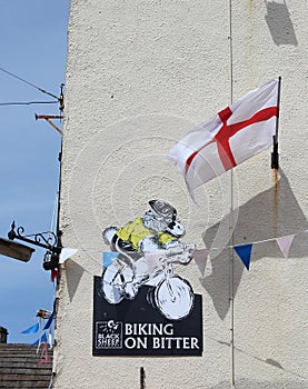 England flag, advert with sheep for Tour de France