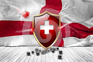 England flag with Metal Shiny red shield. virus protection, hygiene shield. virus Vaccine Protection aganst coronavirus, Health