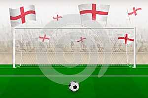England football team fans with flags of England cheering on stadium, penalty kick concept in a soccer match