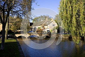 Autumn sunshine on the  River Windrush at Bourton on the Water