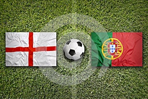 England vs. Portugal flags on soccer field