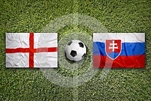 England vs. Slovakia flags on soccer field