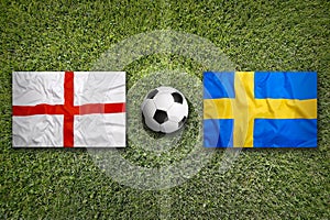 England vs. Sweden flags on soccer field