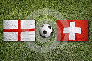 England vs. Switzerland flags on soccer field