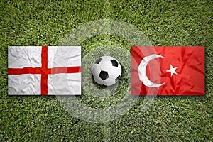 England vs. Turkey flags on soccer field