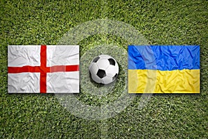 England vs. Ukraine flags on soccer field