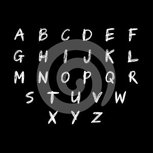 English alphabet. White hand drawn uppercase letters isolated on black background. Chalkboard lettering concept. Grunge font