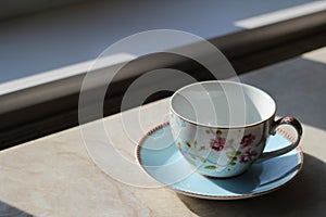 English blue and white tea cup on saucer