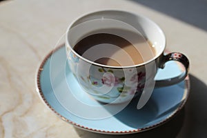 English blue and white tea cup on saucer