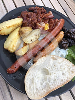 English breakfast with eggs and sausages