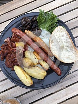 English breakfast with eggs and sausages