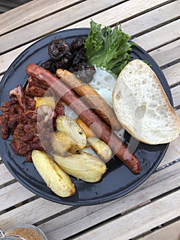 English breakfast with eggs and sausages