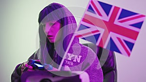 English Caucasian Girl-Gamer Sitting And Playing Computer Games Medium Close-Up Shot