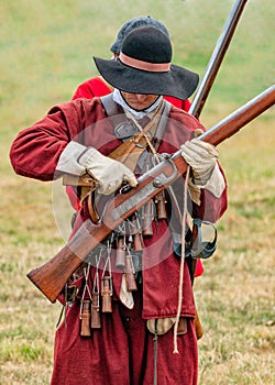 English Civil War Militiaman priming his musket.